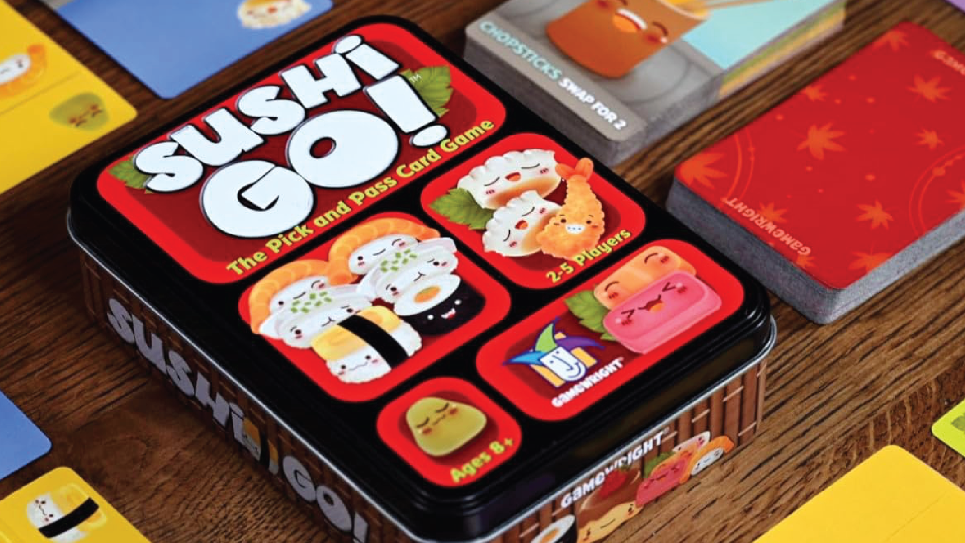 The box and cards for the Sushi Go! card game.
