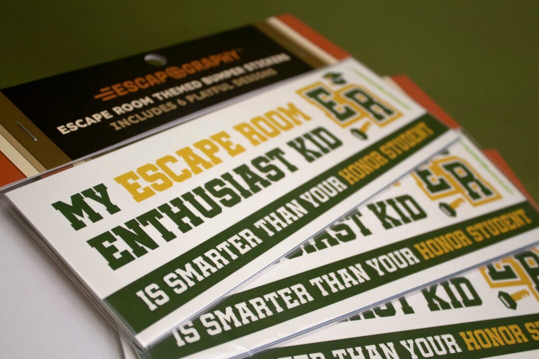 Packages of the bumper sticker set, fanned out.
