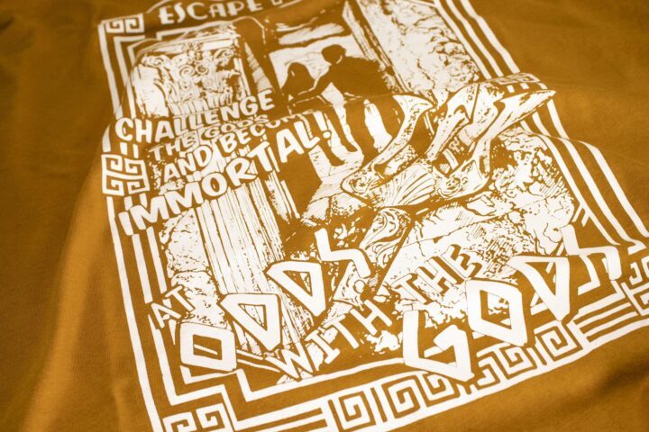 “At Odds With The Gods” Escape Room Tee